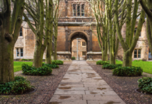 large brick building college campus entrance door