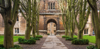 large brick building college campus entrance door