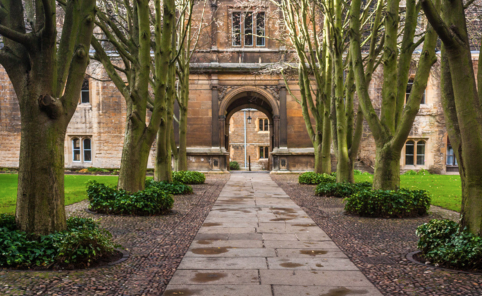 large brick building college campus entrance door